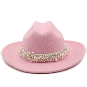Detail of pink wool felt fedora featuring layered pearl band decoration and flat brim