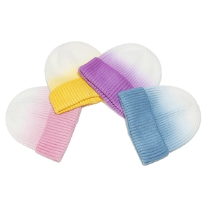 Colorful tie-dye knit beanies for women in four gradient color sets on white background
