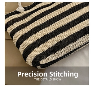 Macro detail of high-quality woven fabric stripes and durable white cotton rope handles