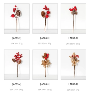 Detail of diverse artificial Christmas berry stems with pine cones and golden leaves