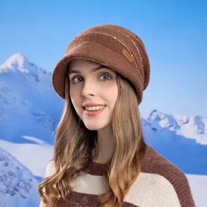 Winter warm knitted brown beanie hat with fleece lining for cold weather outdoors