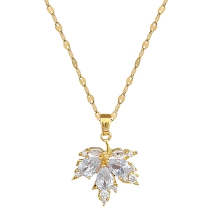 Titanium steel necklace with a golden maple leaf pendant featuring clear zircon stones