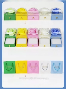 Five-color rose jewelry drawer boxes with matching gift bags in a grid display