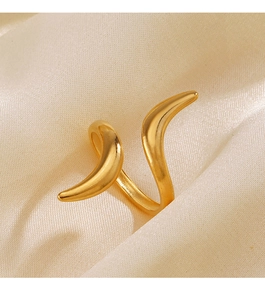 Detailed macro view of an 18K gold-plated stainless steel curved open ring on silk