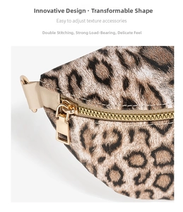 Detail shot of leopard print fabric bag showing high-quality gold zipper and stitching