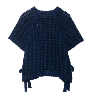 Detailed view of dark blue short-sleeve crochet knit top with V-shaped wave pattern