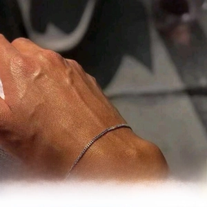 Detail of silver chain bracelet showing vacuum plating and nano-coating texture