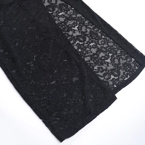 Detail shot of black floral lace fabric with intricate cut-outs and side slit design