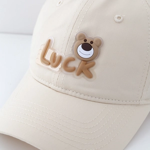 Kids casual beige cotton baseball cap with Luck letter patch and cartoon bear design
