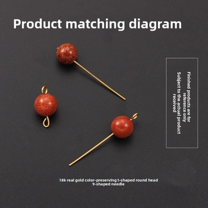 Macro detail of 18K gold-plated pins and goldstone beads for DIY jewelry crafting