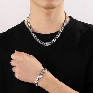 Minimalist silver 10mm CNC diamond-set Cuban link necklace and bracelet set on model