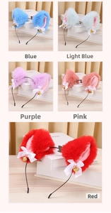 Detail of plush cat ear headbands featuring silk bows and small golden bells in five colors