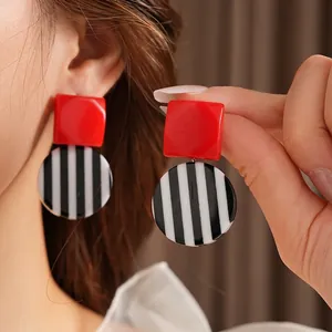 Retro geometric earrings with red squares and black white striped round resin pendants