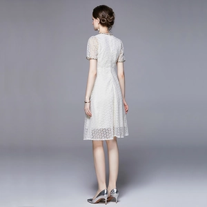 Elegant white lace midi dress with French embroidery and A-line silhouette, back view