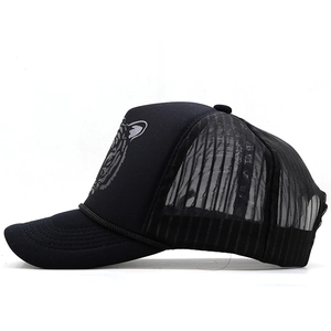 Black trucker hat with silver tiger print and breathable mesh back in a profile view