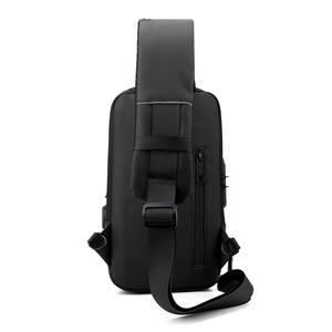 Rear view of black waterproof chest bag featuring wide straps and hidden anti-theft zipper
