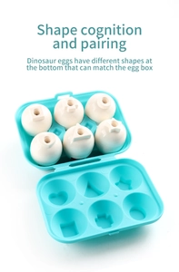 Detail view of 6-piece dinosaur shape matching eggs and storage box for early learning