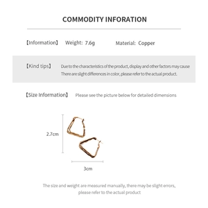 Detail specifications for geometric gold-plated copper earrings showing 2.7cm by 3cm dimensions