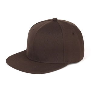Detail view of a dark brown flat-brim snapback hat featuring a durable twill fabric texture
