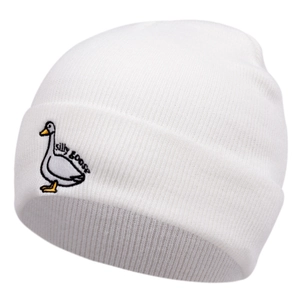 Close-up of silly goose embroidery on white ribbed knit beanie for winter