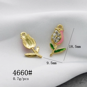 Detail of tulip pendant charm showing dimensions 18.5x9.5mm and pink enamel with rhinestones