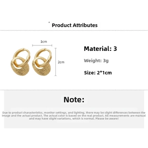 Detail showing 3g weight and 2x1cm dimensions of gold textured oval hoop earrings