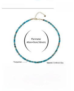 Detail showing 16-inch adjustable turquoise beaded necklace with golden spacer beads