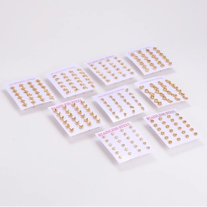 Gold stainless steel stud earrings set featuring butterfly, crown, and paw shapes