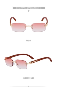Detail of rimless sunglasses with pink gradient lenses and brown wood grain temples