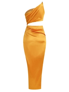 Detail of gold satin dress featuring asymmetric one-shoulder cut and waist cut-out