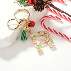 Letter R resin keychain with mini Christmas tree, snowman interior and green tassel charm