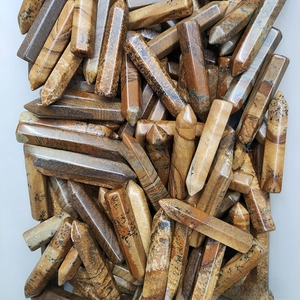 Detailed macro view of hexagonal picture jasper stone with unique brown landscape textures