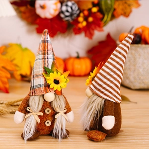 Fall gnome plush set with sunflower hats and maple leaf decor for Thanksgiving display