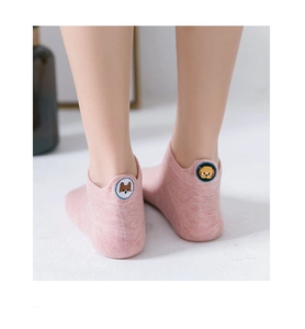 Close-up of pink cotton blend ankle socks featuring cute puppy embroidery on the heel