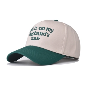 Retro cotton baseball cap in beige and green with embroidered funny quote and flat peak