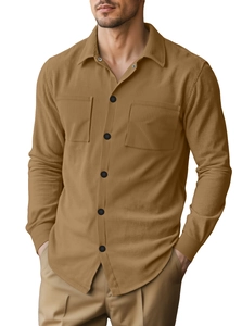 Detail of tan corduroy shirt jacket featuring dual chest pockets and button closure