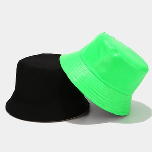 Minimalist glossy PU and matte canvas bucket hats for women in black and neon green colors