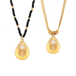 French style starburst pendant necklaces with shell texture and black beaded chain