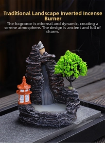Macro view of Chinese landscape backflow incense burner with resin mountain and mist