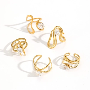 Golden irregular curve zircon stainless steel rings set in a minimalist modern style