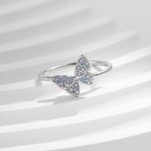 Elegant S925 silver ring featuring a delicate butterfly design with light blue crystal