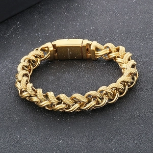 Detailed macro view of gold-plated 316L stainless steel woven chain with secure clasp