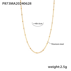 Detailed view of titanium steel gold beaded necklace with 40+5cm adjustable length chain