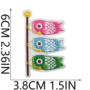 Detail view of colorful carp streamer embroidered patch with precise size measurements