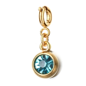 Close-up of 6mm blue round cubic zirconia birthstone charm with gold stainless steel clasp