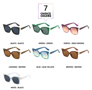 Detail display of large square sunglasses in seven trendy colors including leopard and blue