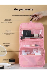 Pink hanging toiletry bag detail with waterproof pockets and mesh compartments