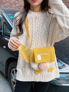 Cute lamb wool duck crossbody bag with yellow strap and plush pompom for casual styling