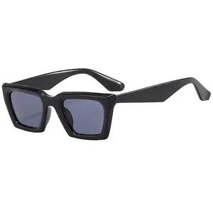 Classic square black sunglasses with dark lenses in a minimalist vintage style frame