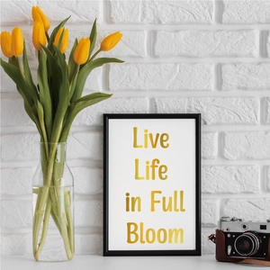 Detail of 1-inch gold waterproof letter sticker showing Live Life in Full Bloom text